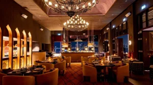 Luxurious Middle Eastern-style restaurant with circular seating and city view