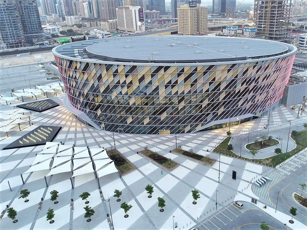 Coca-Cola Arena Dubai with landscaped surroundings.