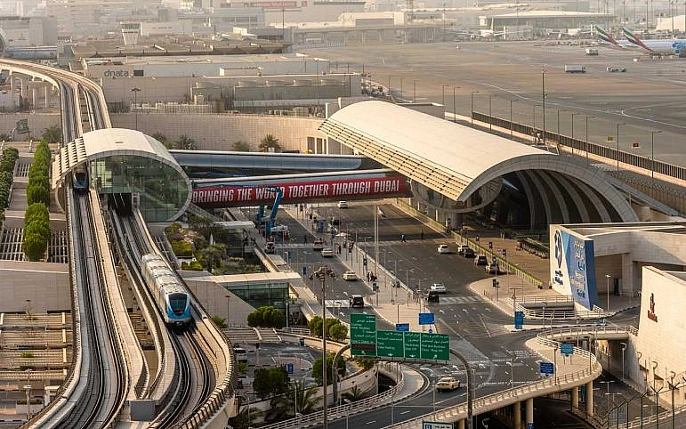 A metro moving on a route that leads passengers to Dubai International Airport for an easy and convenient journey