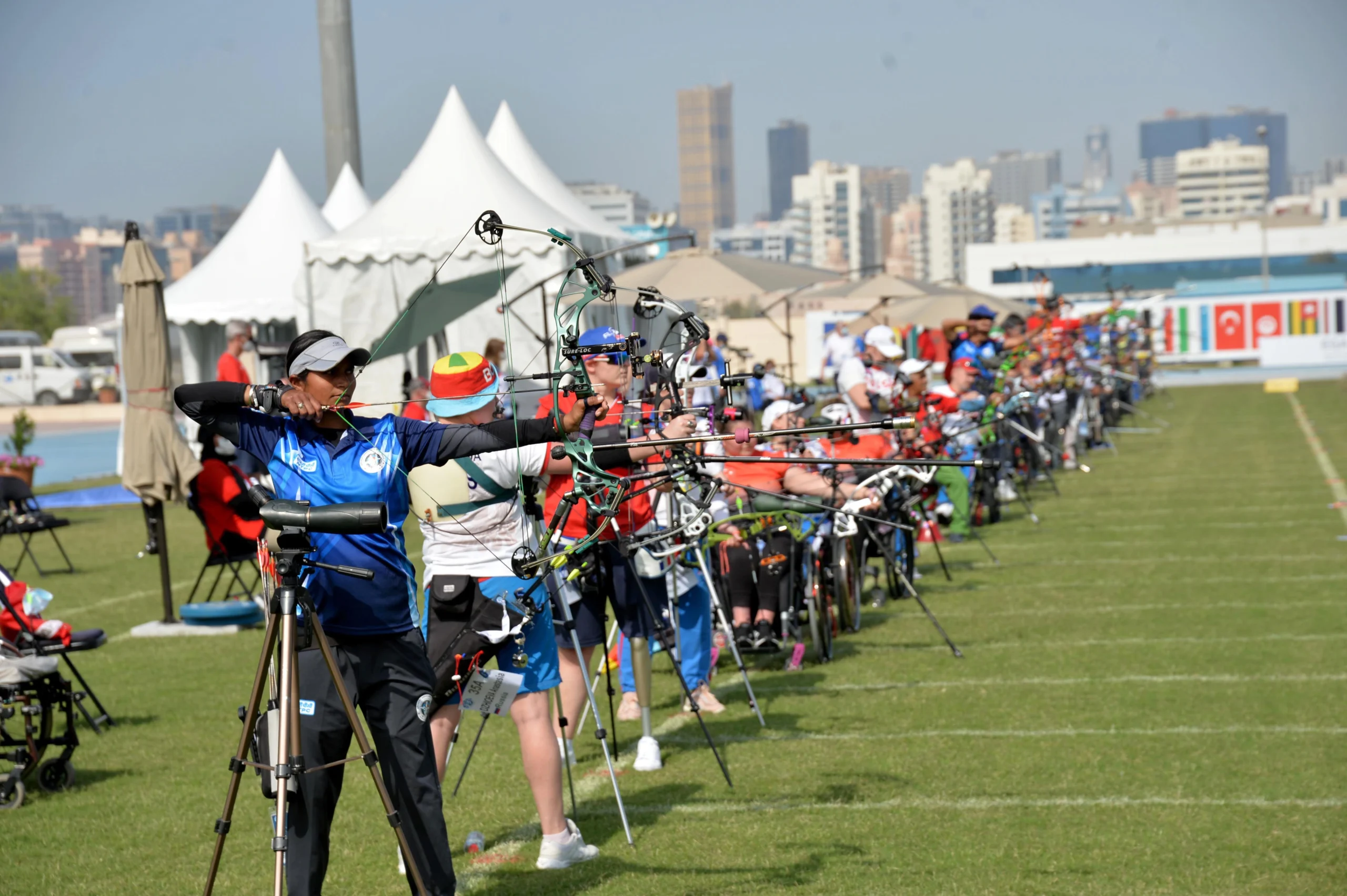 Archers from different countries line up together in action at the Fazza-Para Archery Tournament 2024 in Dubai.