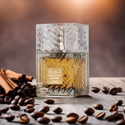 A stylish square bottle of Lataffa perfume is set against a coffee bean and cinnamon background.