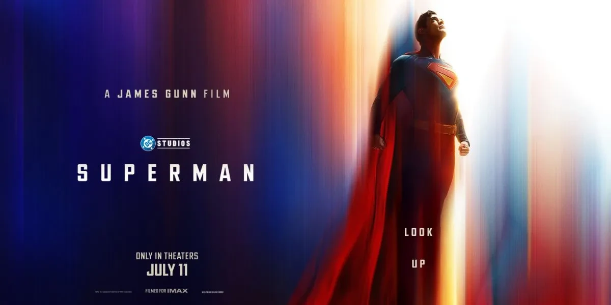 Official Superman movie poster featuring Superman standing amidst light beams, with the text 'Look Up' and release date July 11.