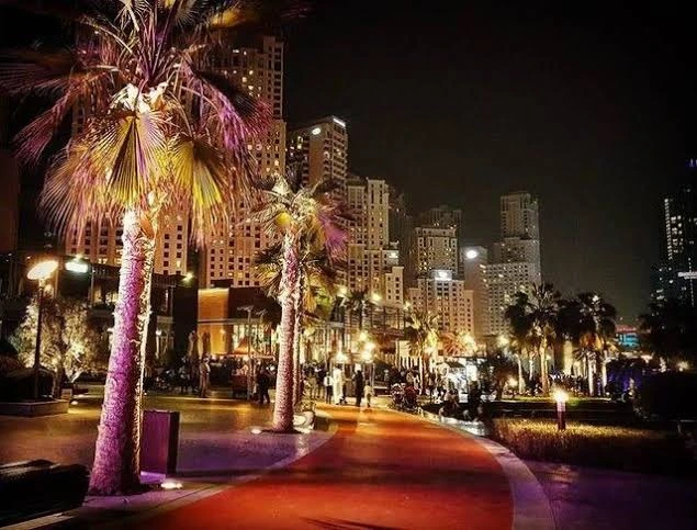 Wooden Food Cart at JBR Beach and people enjoying evening Street Food Delights in Dubai Beach