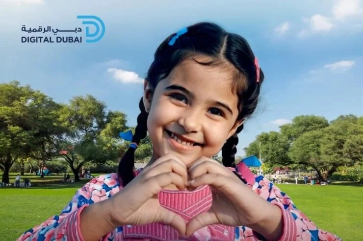 AI-generated young girl smiling and making a heart shape with her hands in a sunny park.
